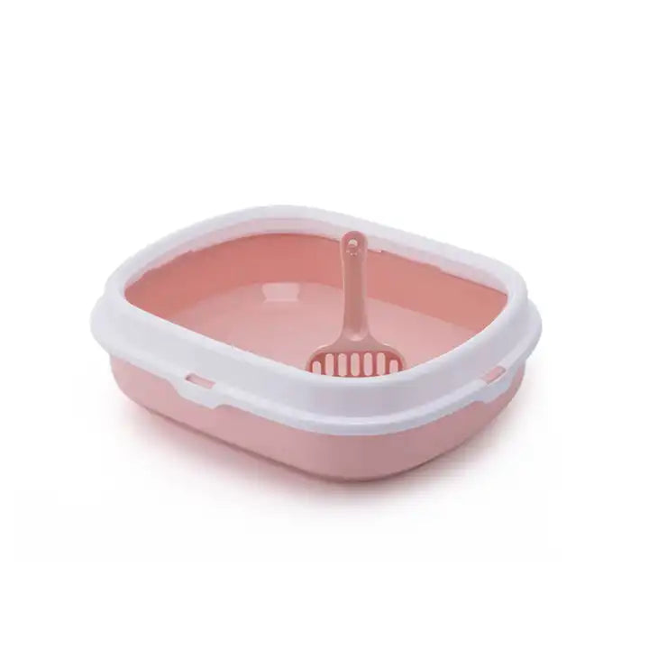 Close-up view of pink cat litter in open box with scoop, showing premium clumping texture, strong odor control, and easy scooping for daily cat hygiene in UAE homes