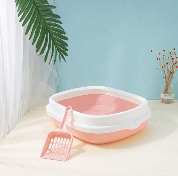Pink cat litter open box with scoop full side view, showing clumping litter for easy scooping, strong odor control, and hygienic daily cat litter maintenance in UAE homes