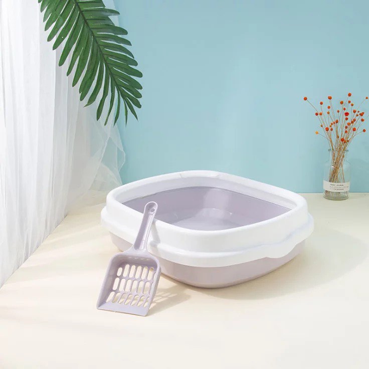 Purple cat litter open box with scoop full side view, showcasing clumping cat litter for easy cleaning, strong odor control, and daily cat hygiene for modern UAE households